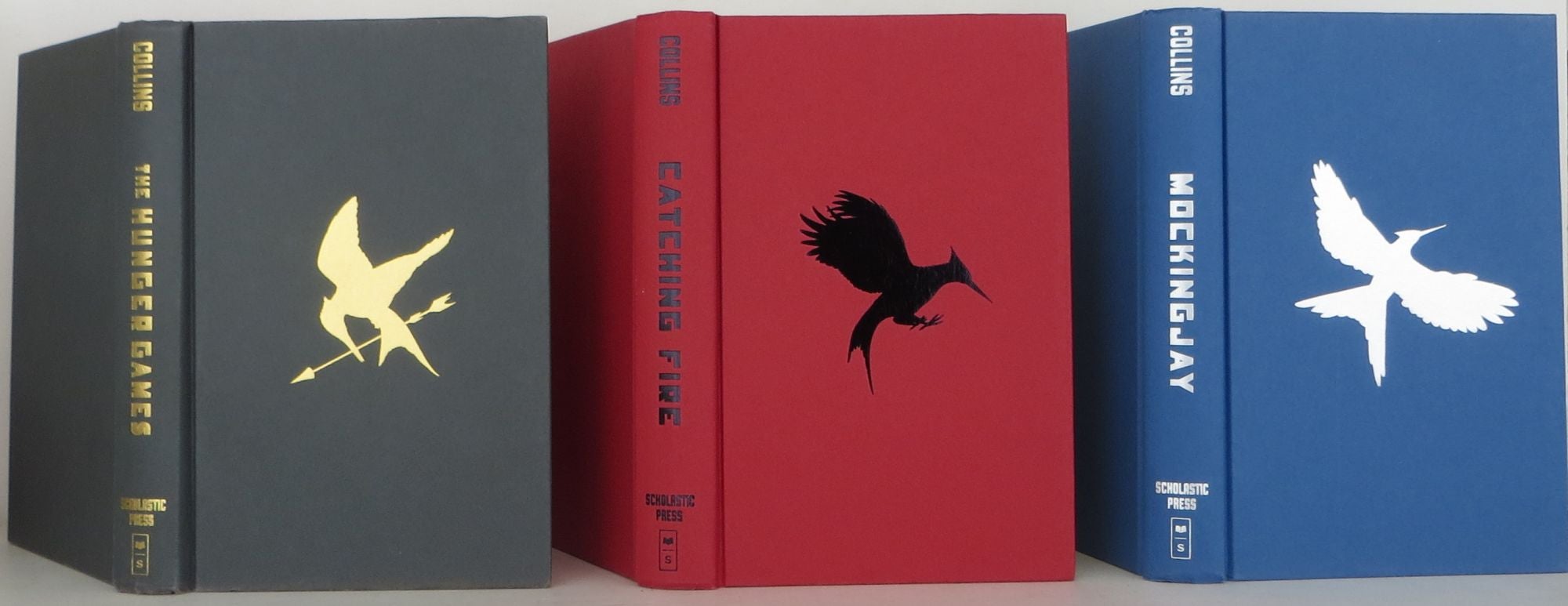 Hunger Games Trilogy: Hunger Games / Catching Fire / Mockingjay Scholastic  Press