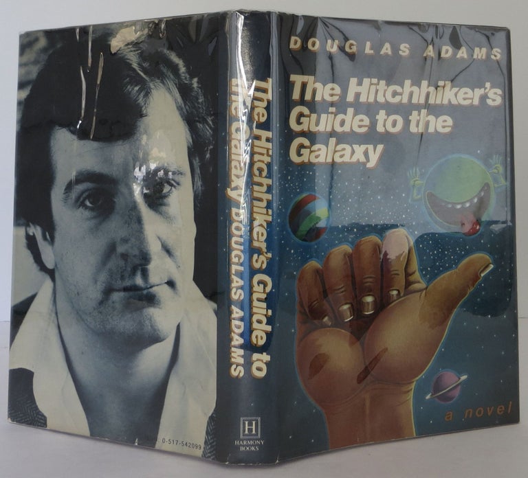 Item #2210401 The Hitchhiker's Guide to the Universe. Douglas Adams.