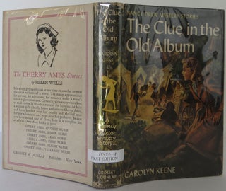 Item #2306109 The Clue in the Old Album. Carolyn Keene